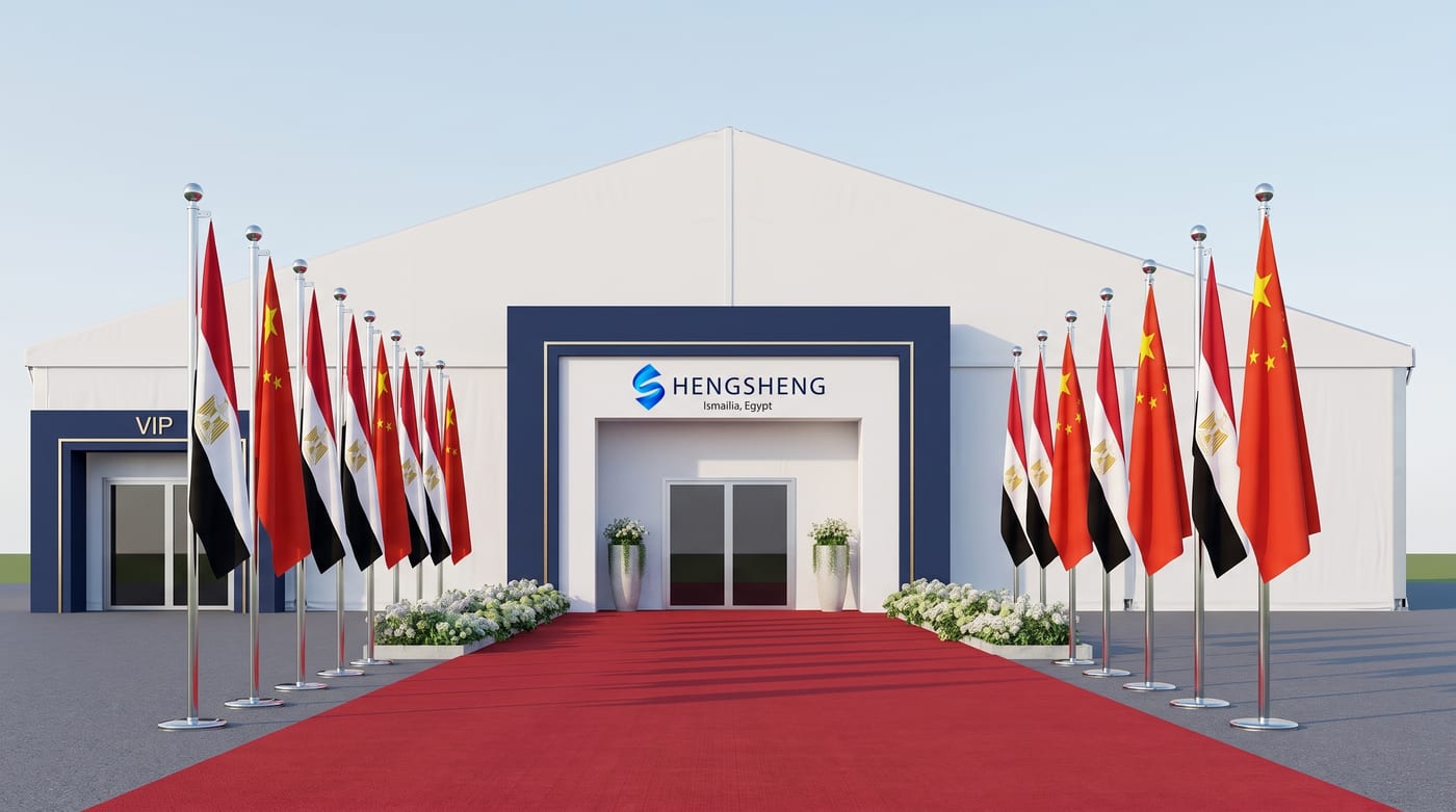 Ceremonial entrance gate — red carpet & flags