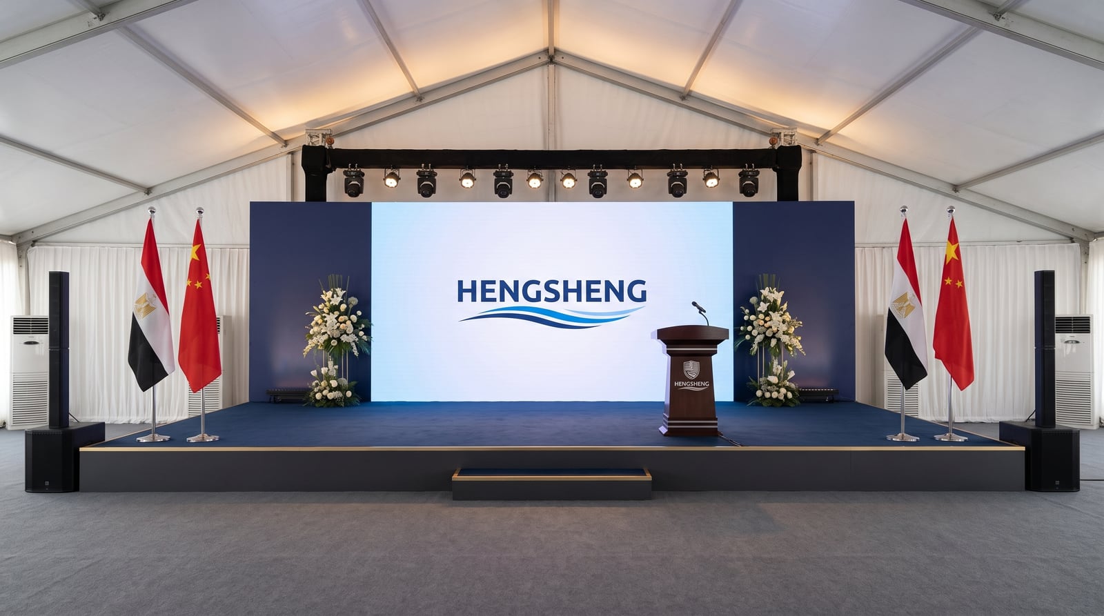 HENGSHENG main stage — LED screen, podium, Egypt and China flags